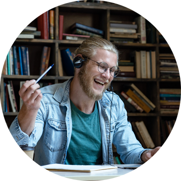 Word360 translator working on audio translation and enjoying his work Word360 translator working on audio translation and enjoying his work
