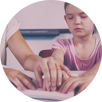 Blind person reading a braille document translated by word360