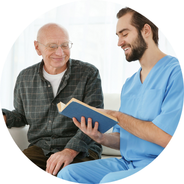 Face to face interpreter reads important documents to an elderly patient 