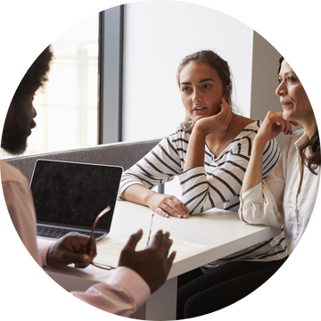 Word360 face to face interpreter facilitating a conversation between two clients Word360 face to face interpreter facilitating a conversation between two clients