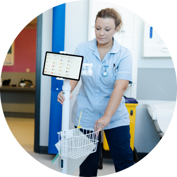 University Hospitals Birmingham nurse using Wordskii on Wheels to communicate with a patient