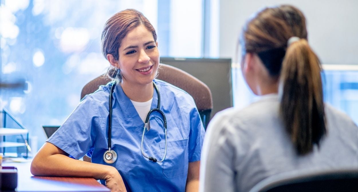 Interpreter supporting a patient during a face to face interpreting appointment