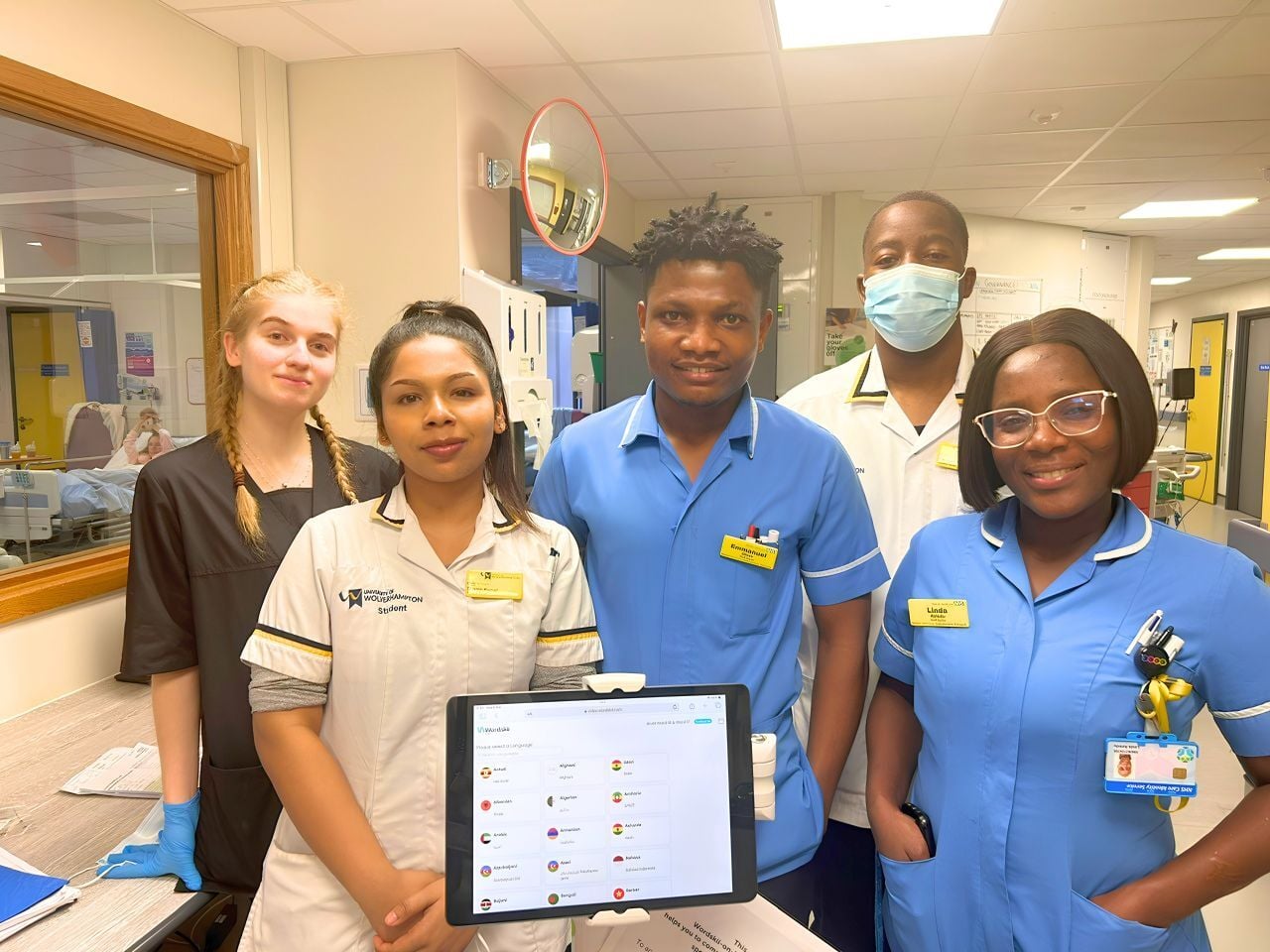 Walsall Manor Nurses with a wordskii on wheels Device
