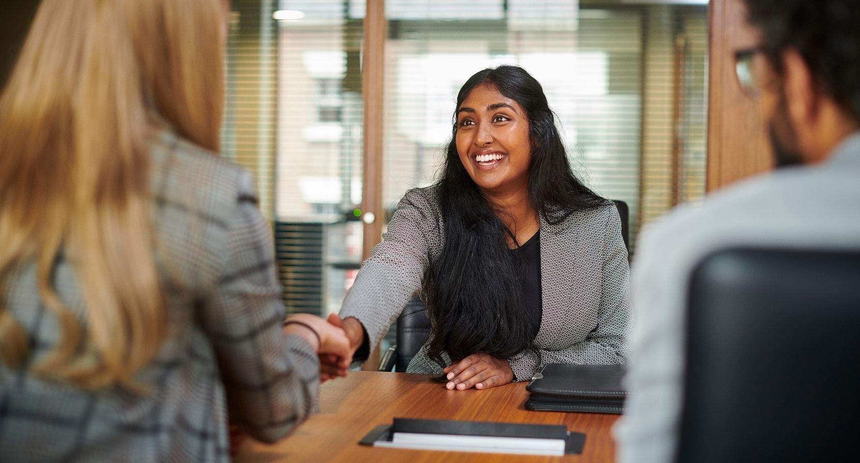 persom talking with clients