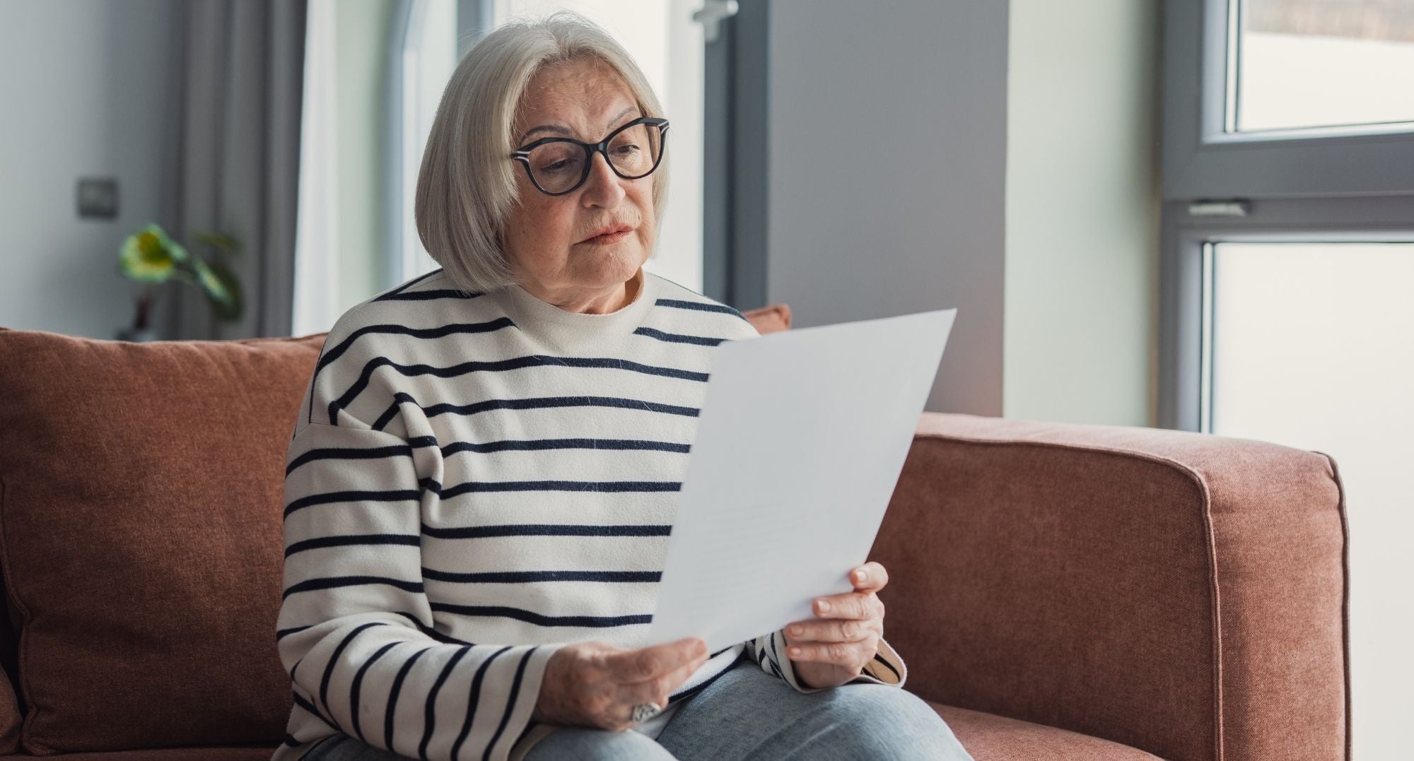 woman reading a document translated to large print