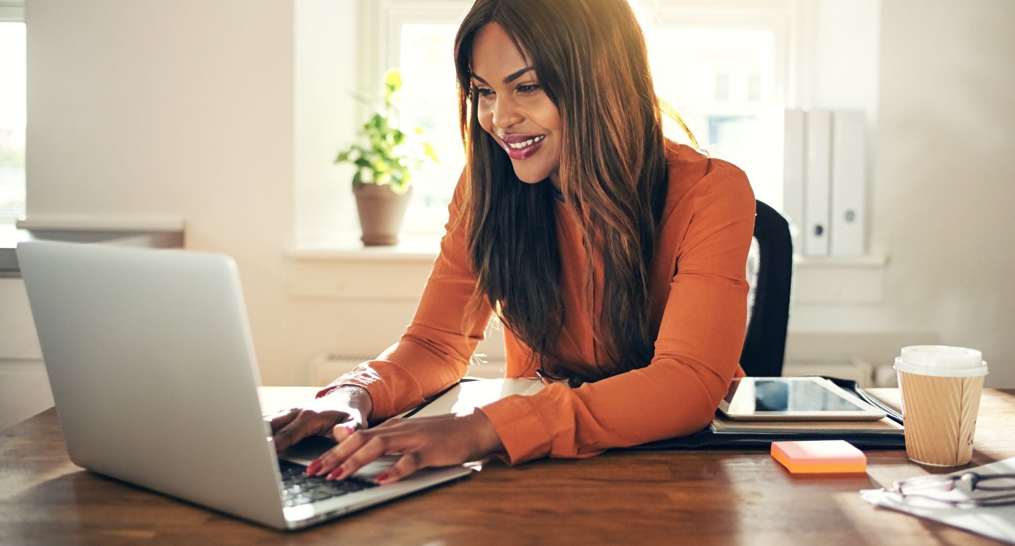 woman looking at a piece of transcreation